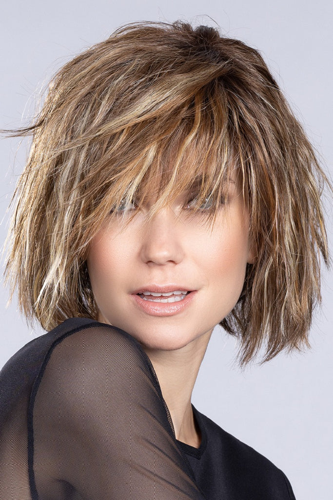Front photo of a model wearing the medium length wig. 