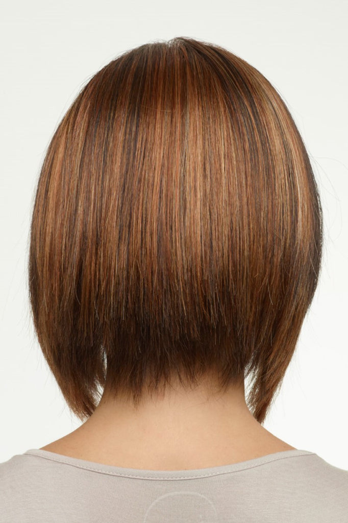 Women's back of the head as she is wearing Envy Kimberly in a coper toned brunette color.