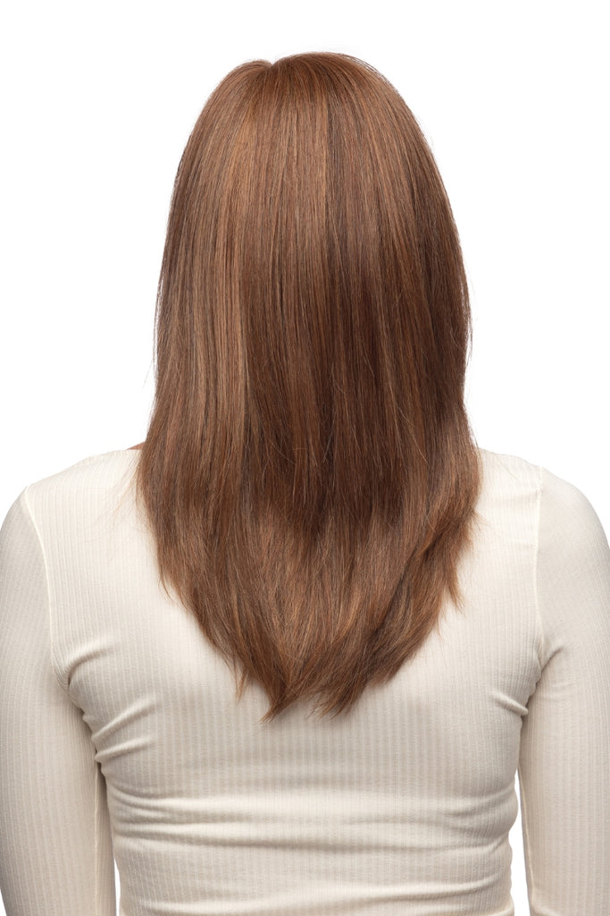 Back view of women modeling a sleek long length wig with subtle layering.