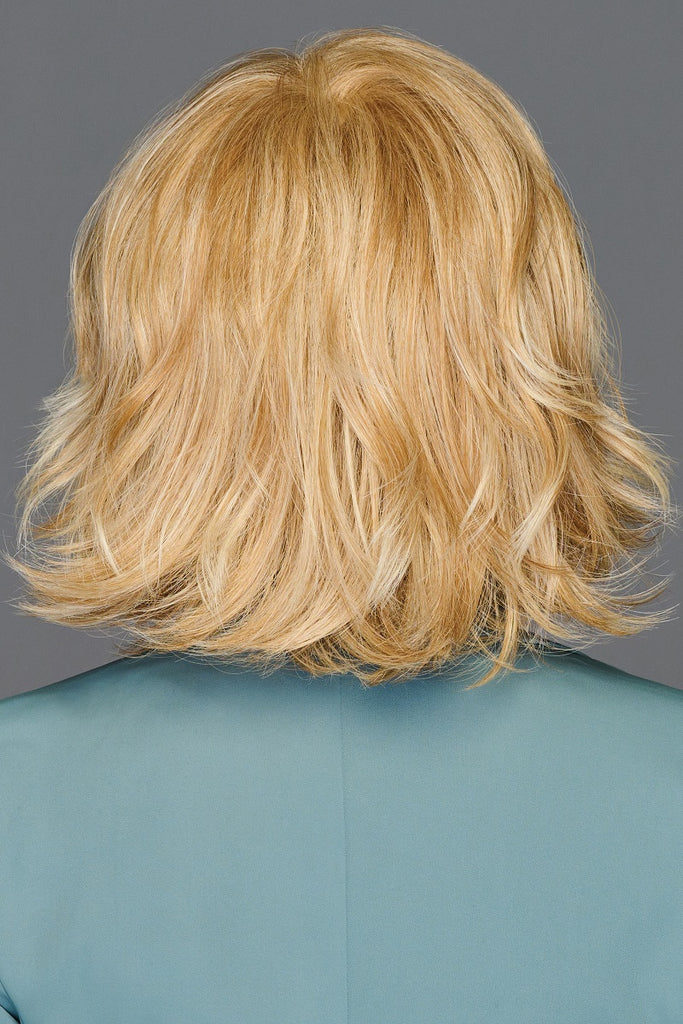 Back view of a model wearing a Flexlite fiber wig. 