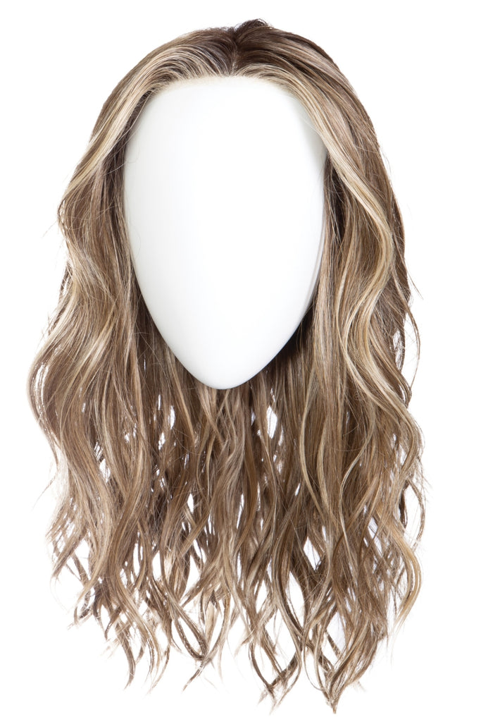 The long wavy wig on a mannequin. 