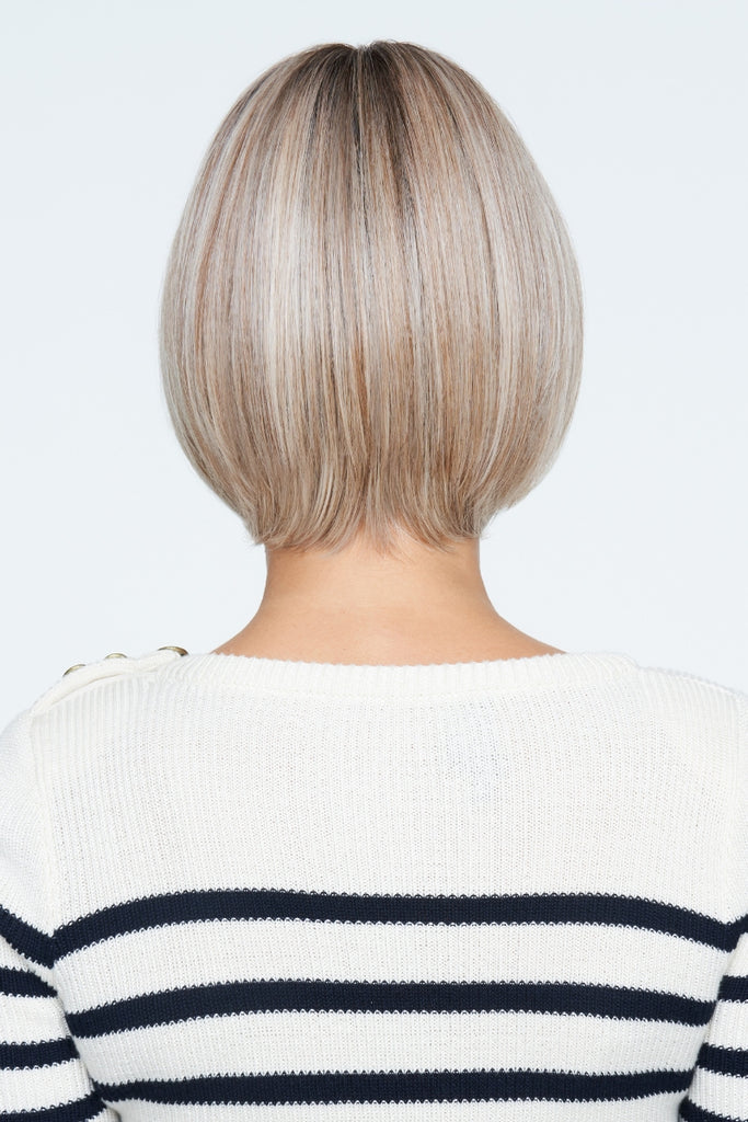 Back view of women model a modern and timeless heat friendly synthetic wig.