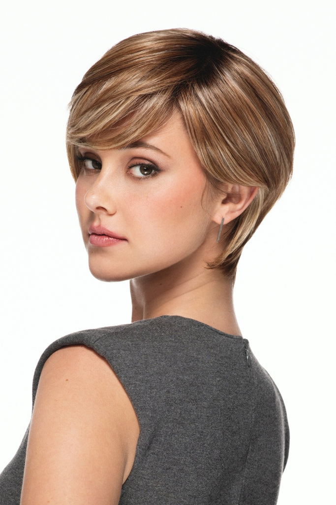 Close up of styled pixie cut wig with longer top layers and a close cropped sides.