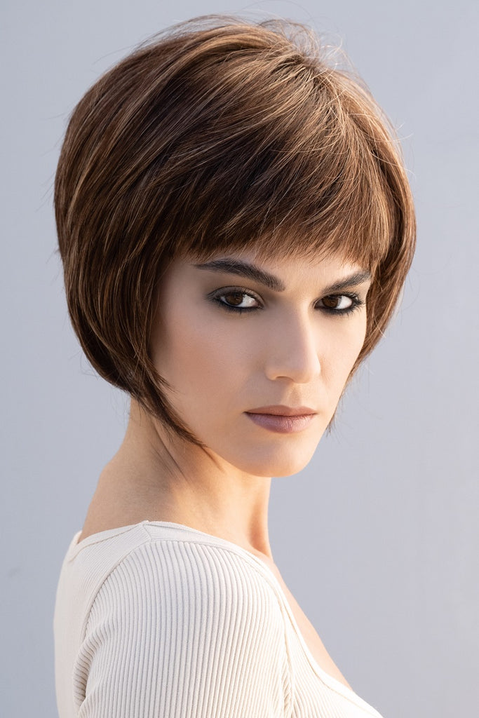 Model wearing the Rene of Paris wig Nell (#2408) 1.