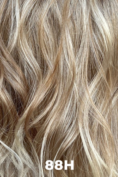 Dark Strawberry Blonde w/ Light Wheat Blonde highlights.