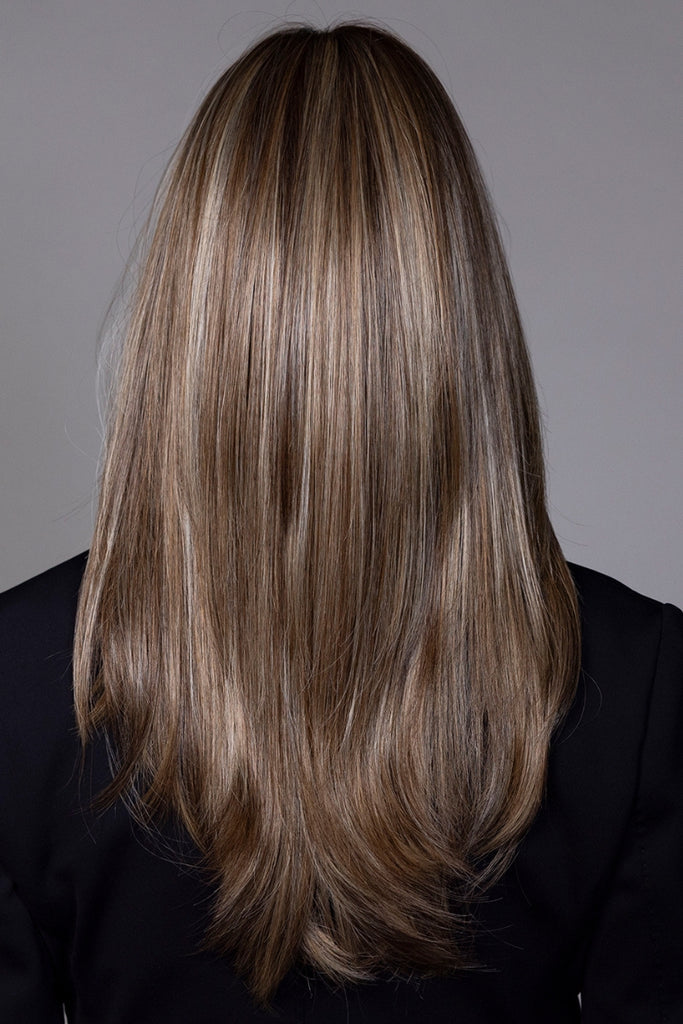 Back view of the long straight syle with soft layers.