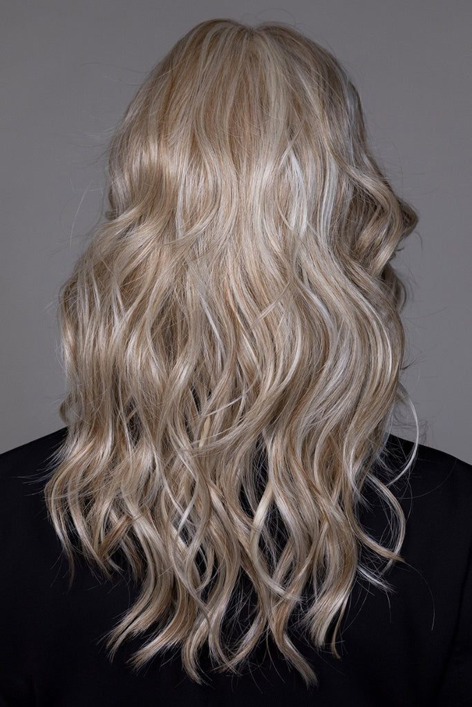 Back of model wearing the color Cream Soda Blonde.