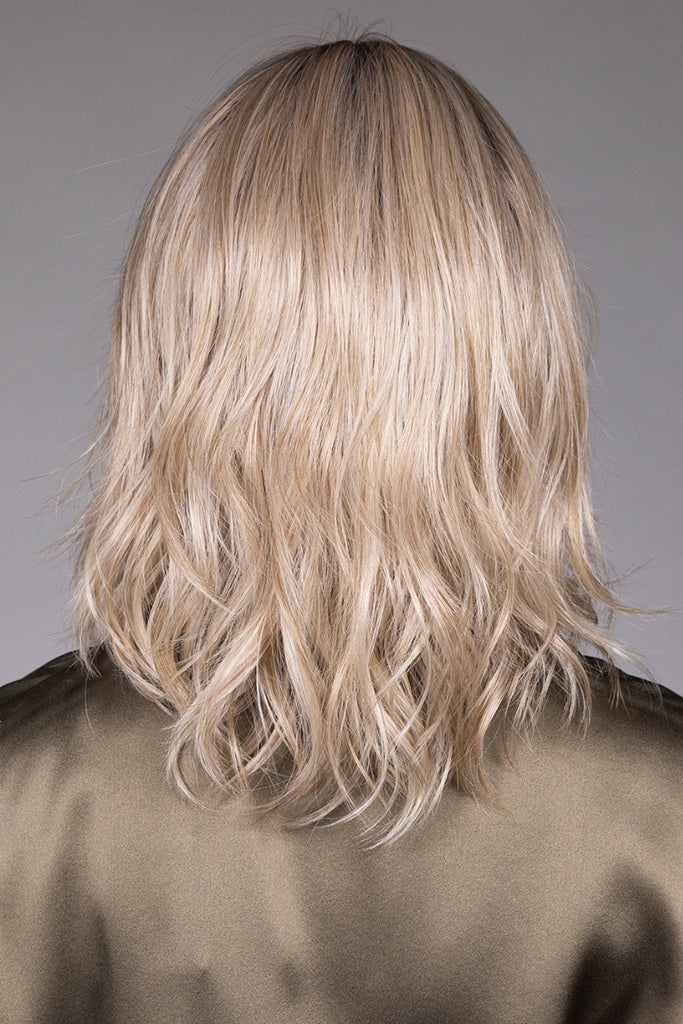 Back of model wearing the color Butterbeer Blonde.