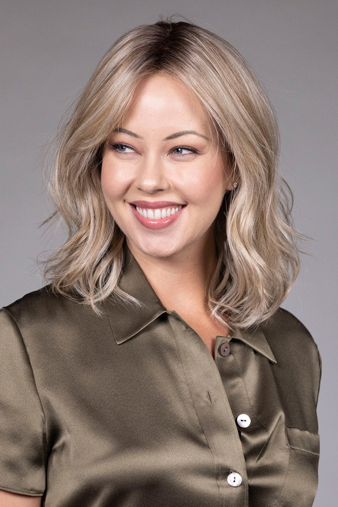 Model wearing Peerless 14 by Belle Tress.