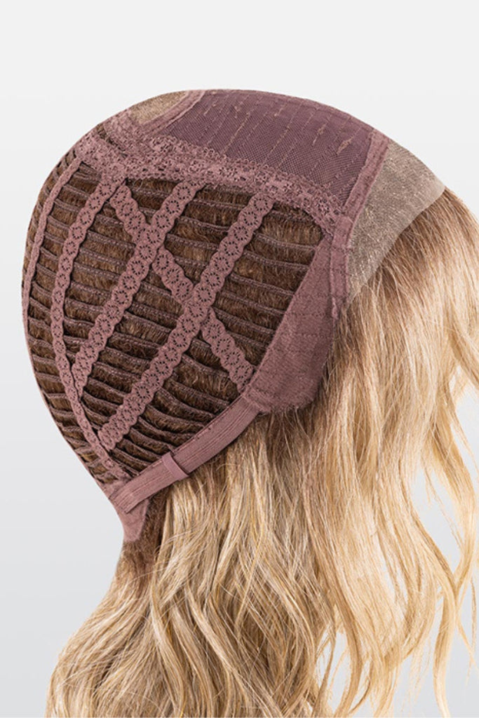 Side cap construction of an open wefted back.