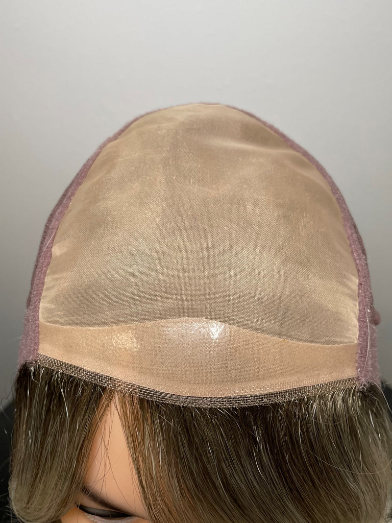 Double monofilament cap for ultra natural looking wigs and comfort for women wearing wigs.