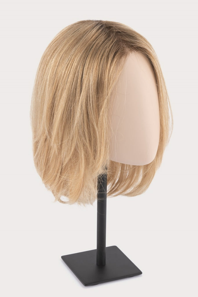 The medium length topper on a mannequin.