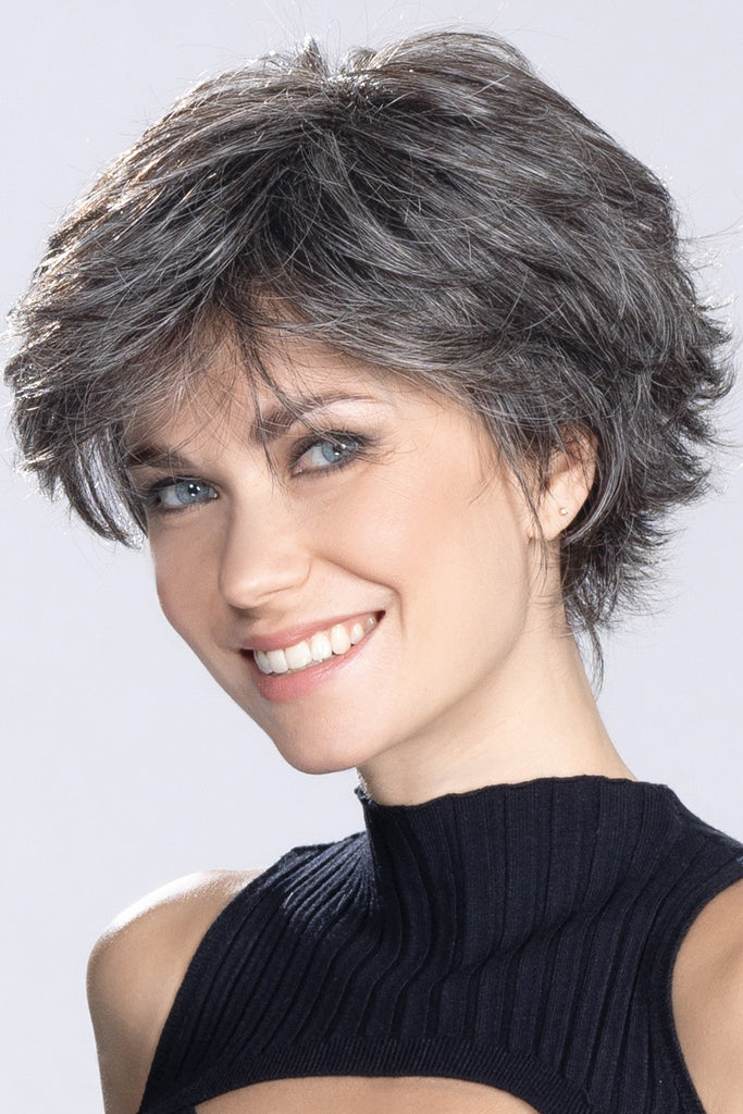 Photo of a woman wearing the synthetic shag wig.