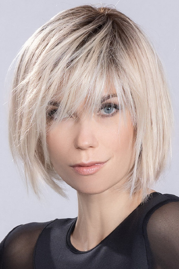 Photo of a woman wearing the heat friendly wig. 