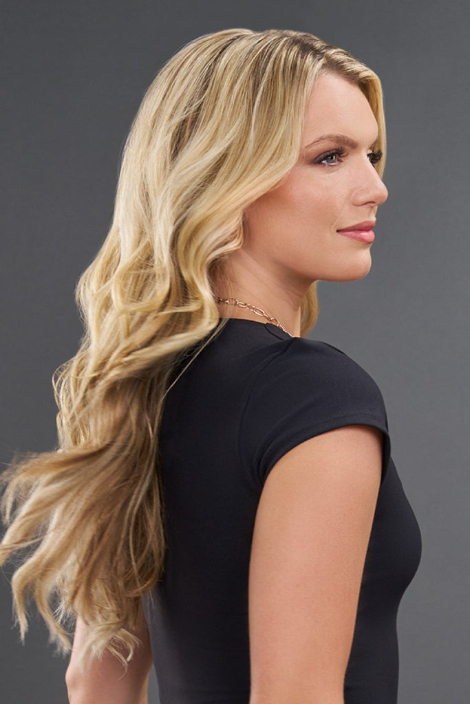 Side view of women styling an adjustable invisible wired extensions.