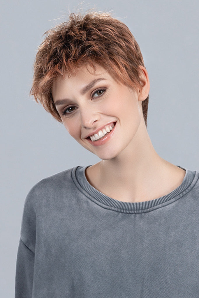 Woman wearing the color Rosewood Rooted.