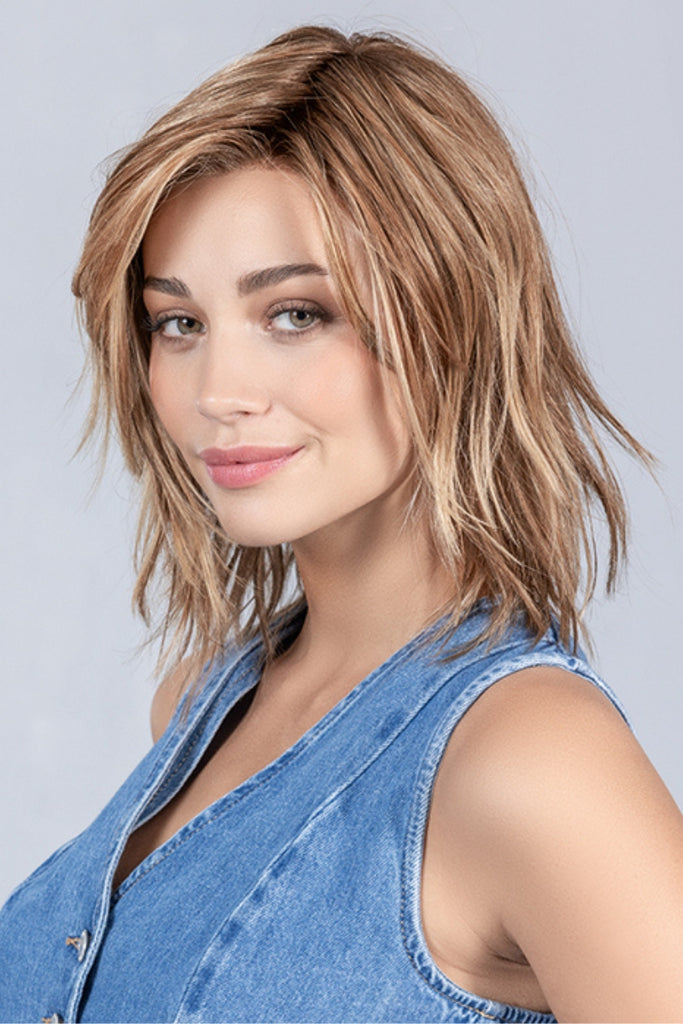 Side view of model styling Flow in the color Light Bernstein Rooted.