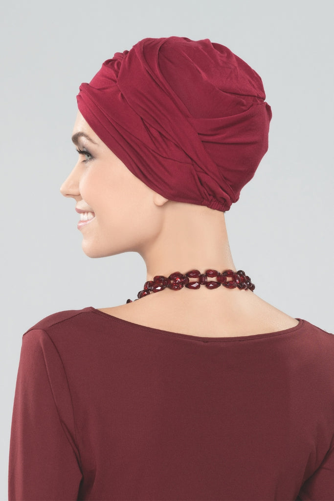 Side of model styling the color Burgundy.