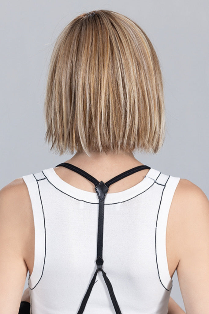 Back of model wearing the color Sand Multi Rooted.