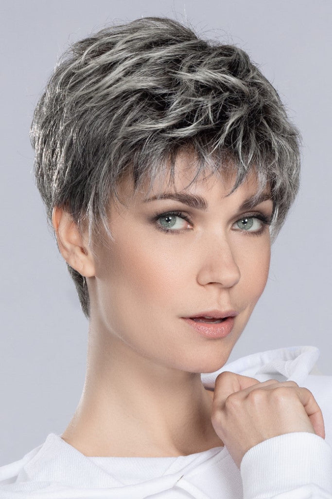 Model wearing a wig by Ellen Wille in the color Salt/Pepper Rooted.
