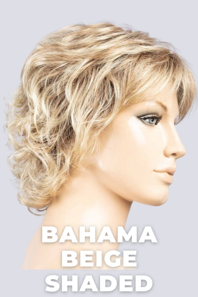 Medium Honey Blonde with Light Ash Blonde Highlights, and Very Light Red-Brown Undertones.