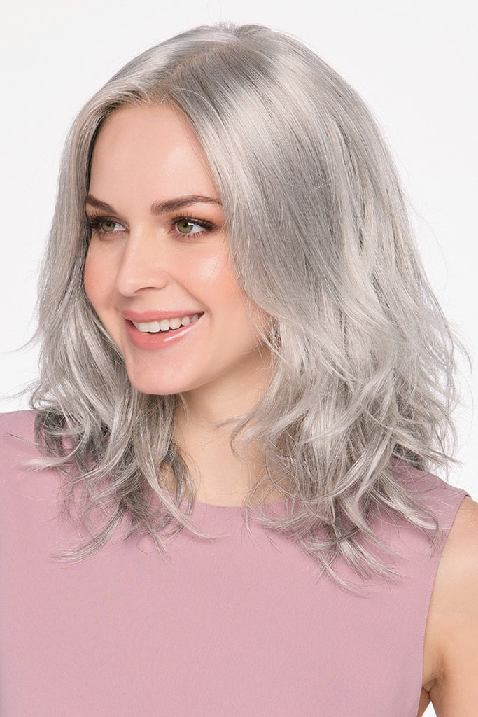 Model styling Amanda in the color Medium Grey.