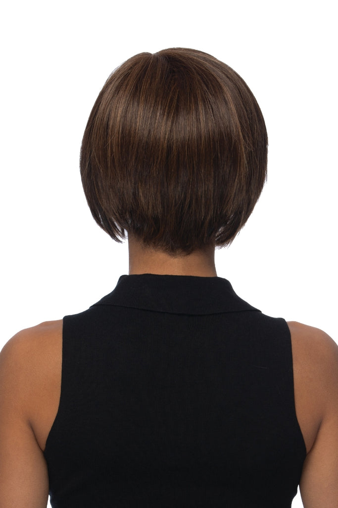 Back of woman wearing a stacked bob wig.