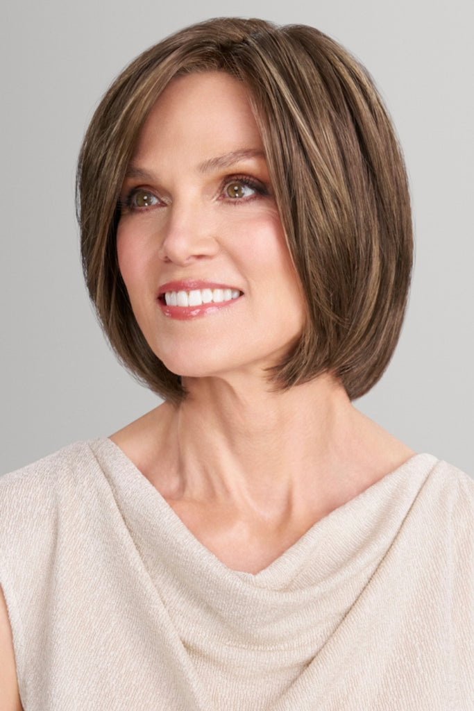 Woman wearing Ava by Jon Renau.