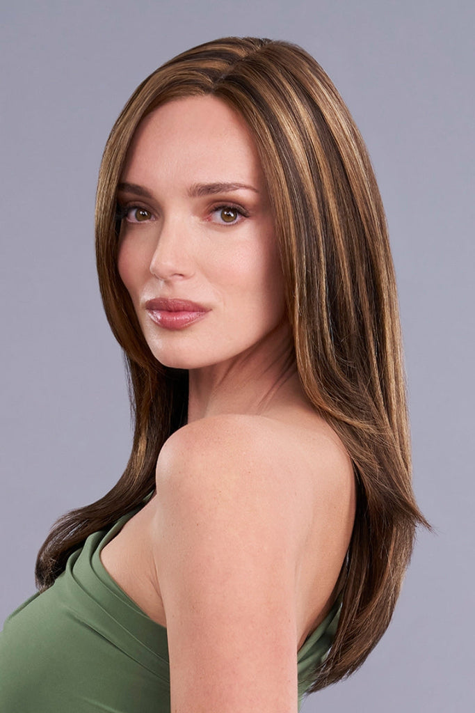 Model wearing a long layered wig by Jon Renau.