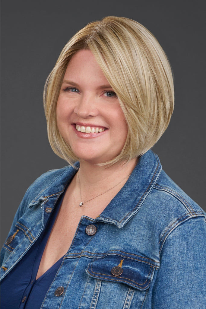 Model wearing a short bob cut wig.