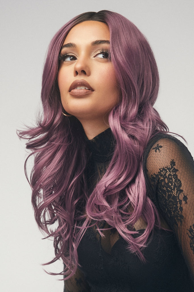 Model wearing Allure Wavez in the color Mauve Berry.