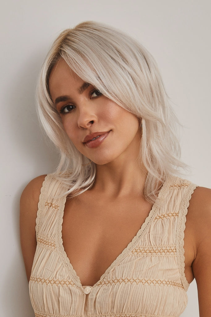 Women wearing the color Ghost Blond.