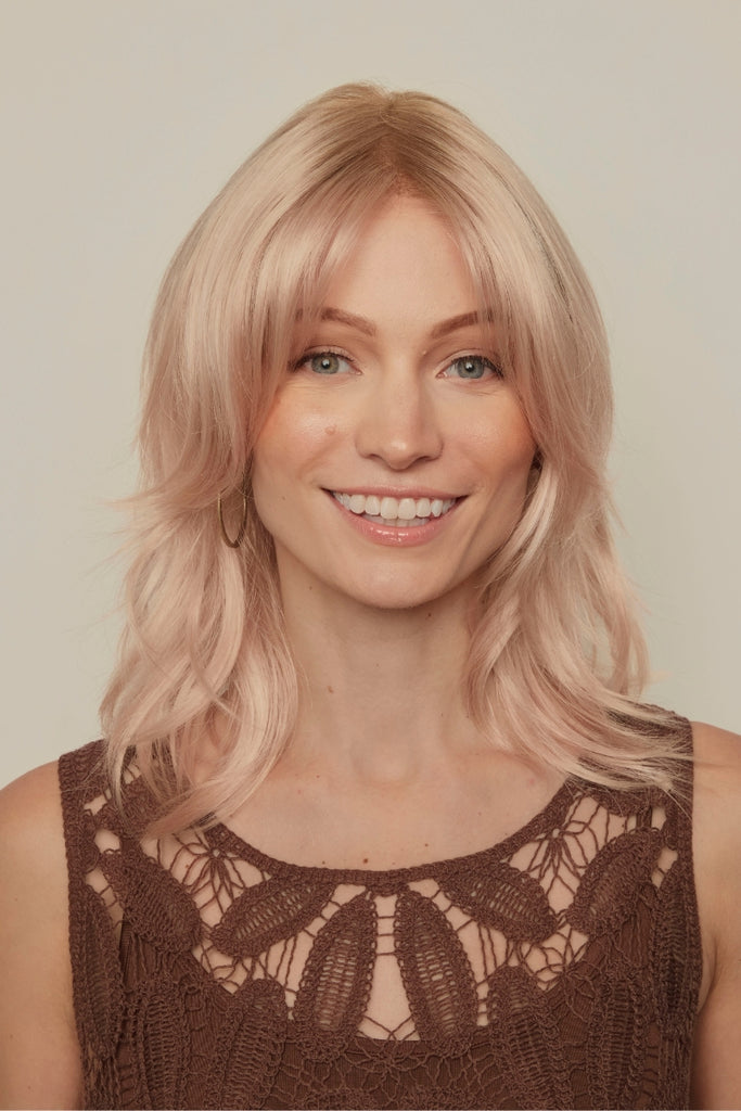 Model wearing the color Snowy Peach-R by Orchid wigs.