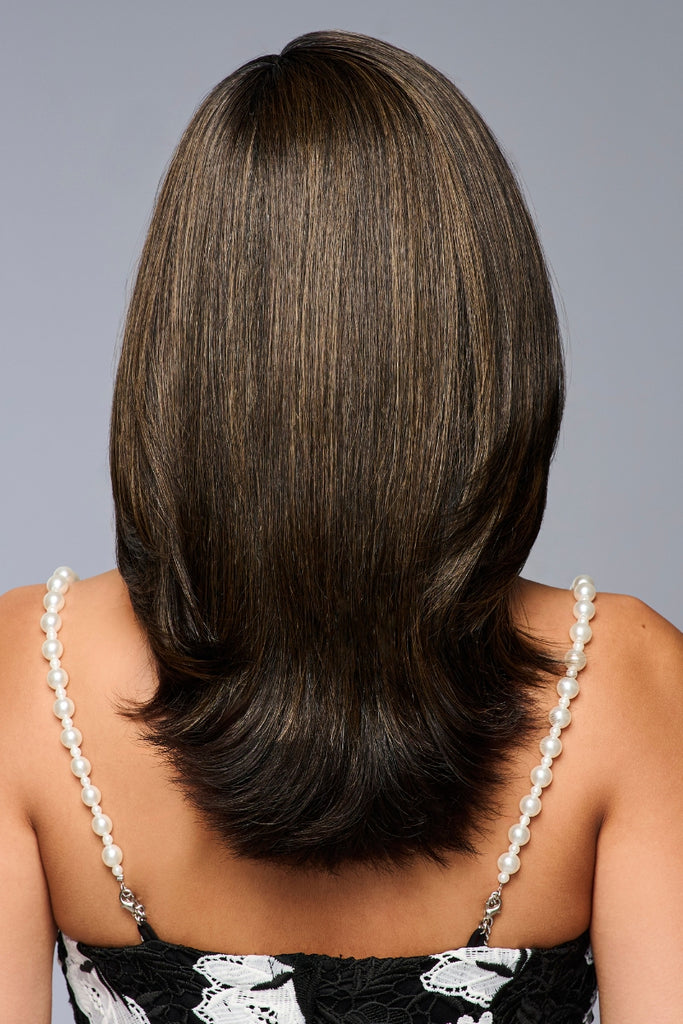 Back view of the heat friendly synthetic topper by Raquel Welch.