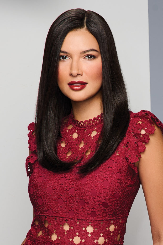 Woman wearing Unmatched 18" topper by Raquel Welch.