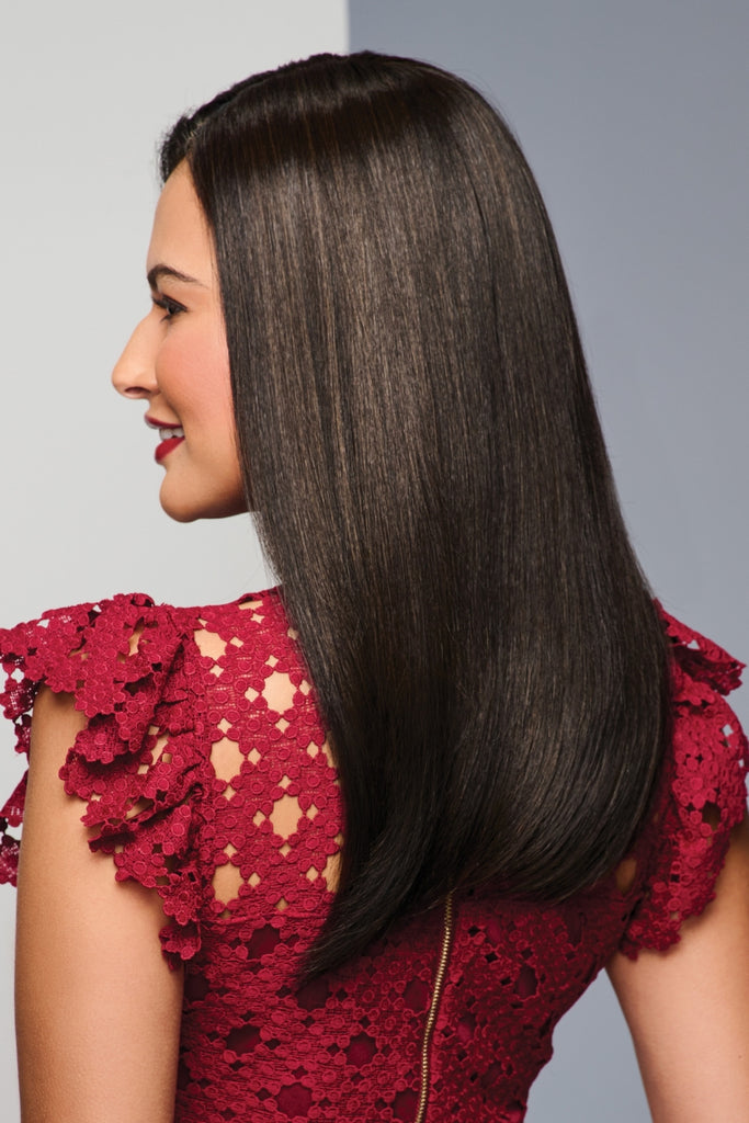 Side view of the heat friendly synthetic topper by Raquel Welch.