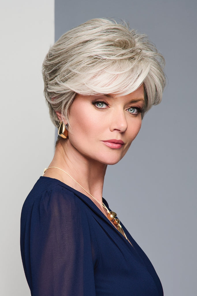 Woman wearing a layered pixie.