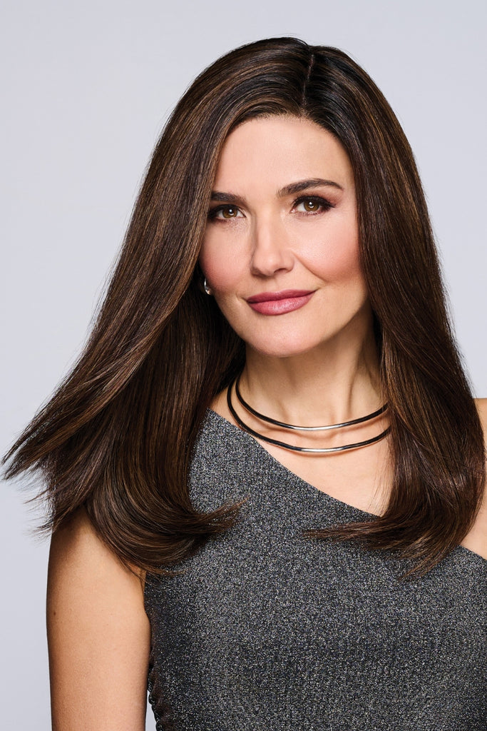 Woman wearing a long, layered style.