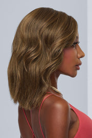 Model wearing Raquel Welch wig Big Spender 10.