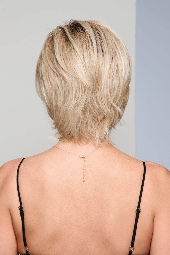 Back of model wearing a bob by Raquel Welch wigs.