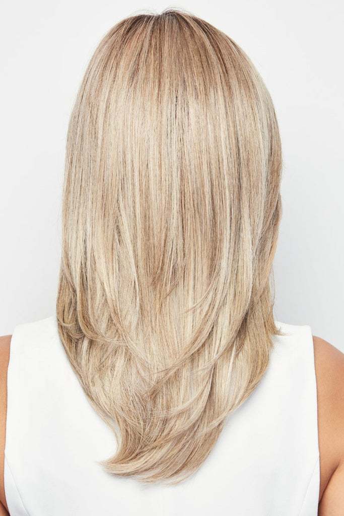 Model wearing Raquel Welch wig Spotlight 10.