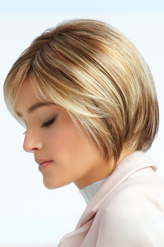 Side view of woman wearing a sculpted bob to frame the face.