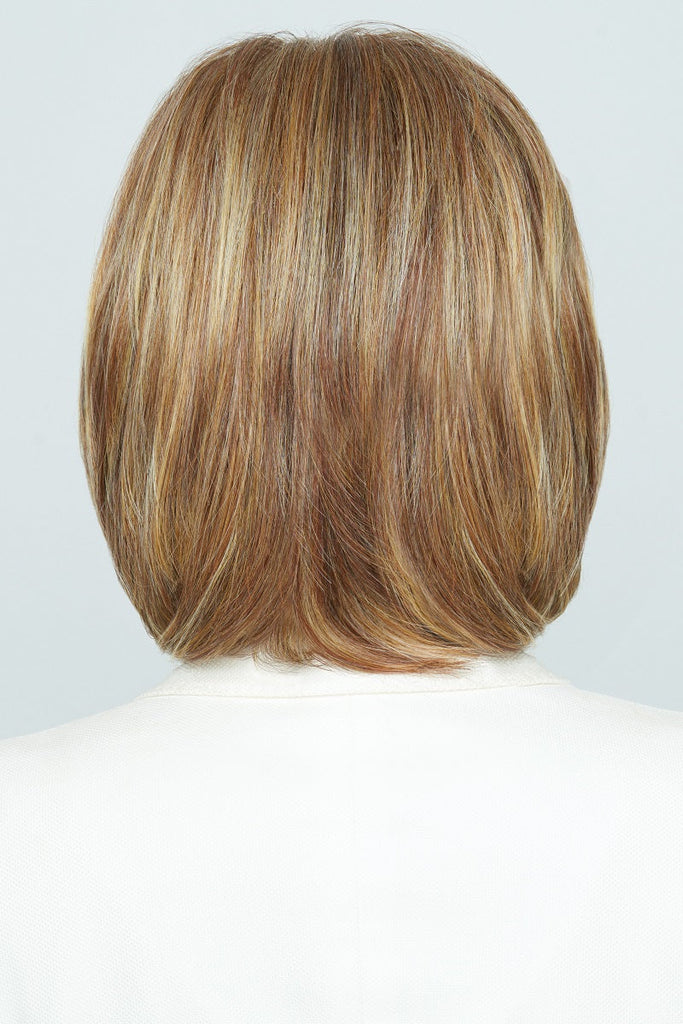 Model wearing Raquel Welch wig On In 10! 5.