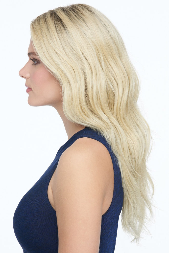 Model wearing Raquel Welch wig Statement Style side view 4.