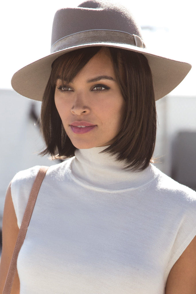 Model wearing the Rene of Paris Top Piece Halo Bob (#736) 1.