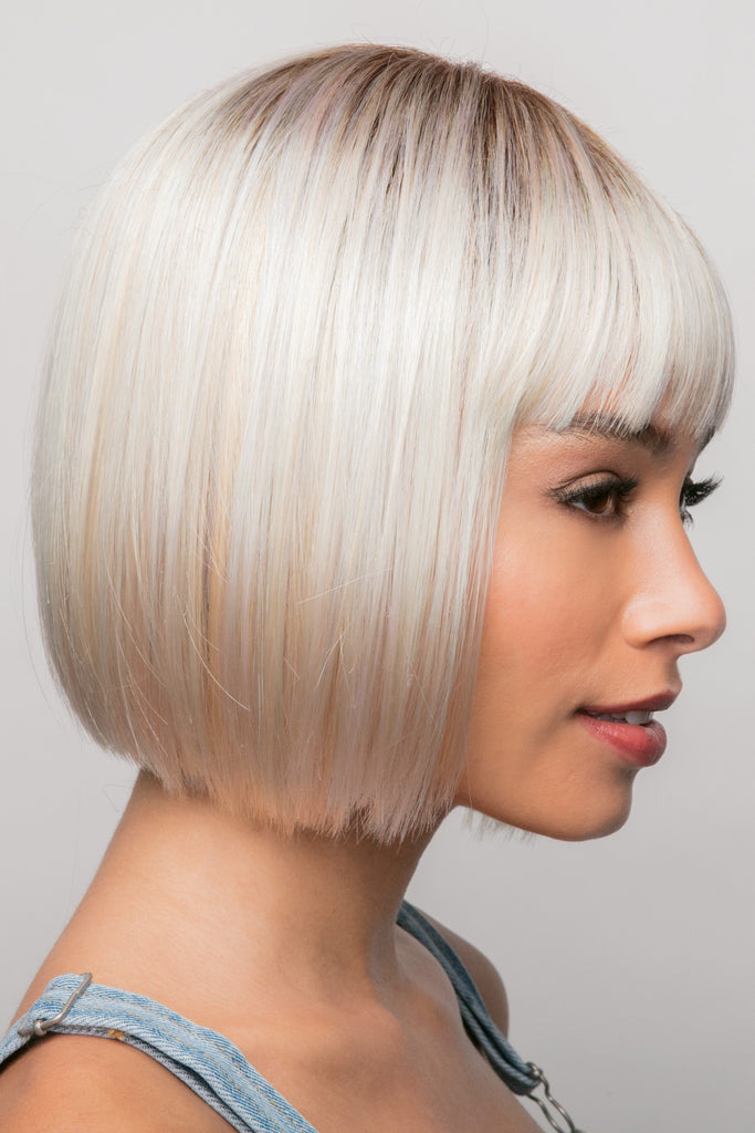 Model wearing the Rene of Paris wig Nico #2392 8.