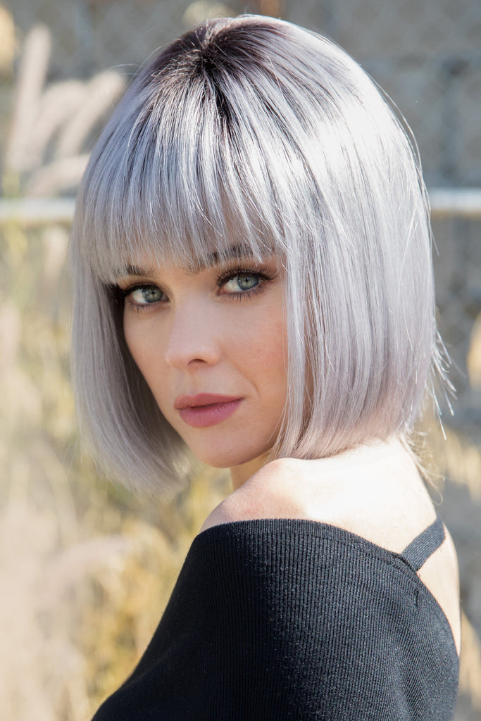 Model wearing the Rene of Paris wig Nico #2392 11.