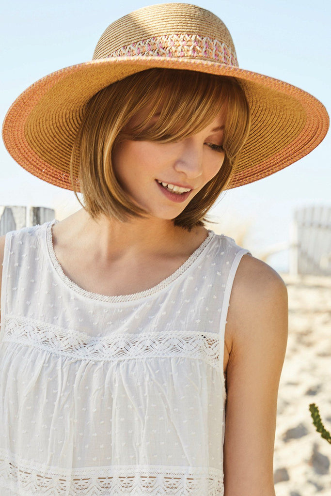 Model wearing the Rene of Paris Top Piece Halo Bob (#736) 3.