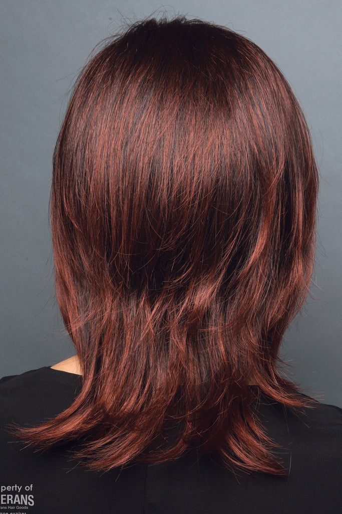 Model wearing the Rene of Paris wig Jade #2313 8.