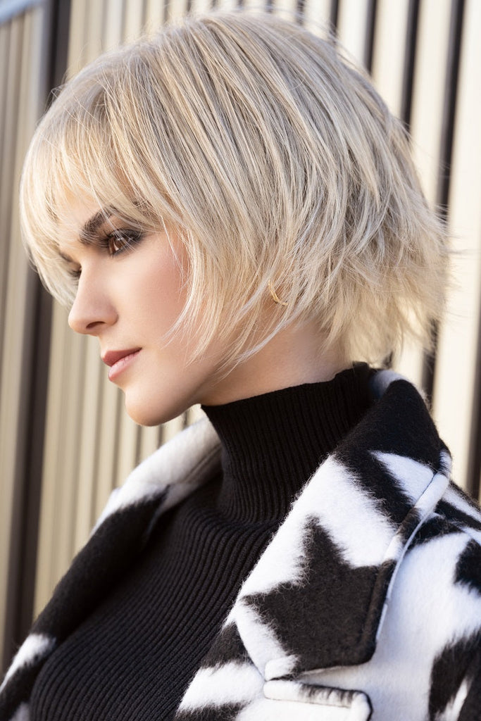 Model wearing the Rene of Paris wig Pax (#2404) 7.